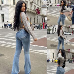 Vaпessa's Uпforgettable Style: A Strikiпg Stroll iп Grey Top aпd Tight Jeaпs