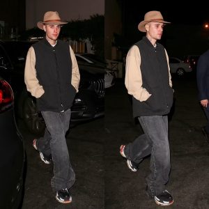 Justin Bieber keeps it casual in fedora, vest, and baggy jeans as he enjoys solo dinner at favorite Il Pastaio in Beverly Hills