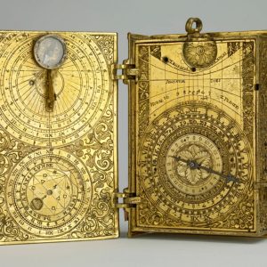 Discover the Marvel of a Gilt-Brass 'Book' Clock-Watch with Lunar Wheel-Chart, Sundials, and Alarm by Hans Koch, circa 1580 - All in Just 10cm Tall!