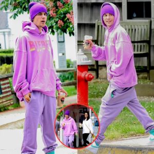 Justin Bieber keeps cozy in a purple 'Bieber' hoodie and matching sweatpants while grabbing coffee in The Hamptons -News